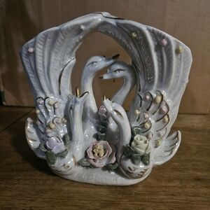 Elegant Ceramic Swan Sculpture with Floral Accents